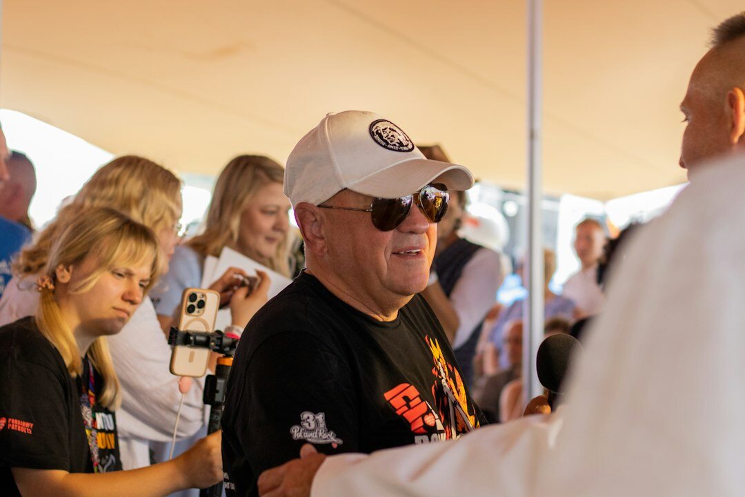 athlete signing autographs